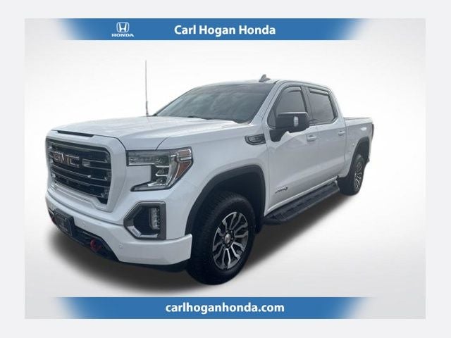 2020 GMC Sierra 1500 AT4 in Summit White — front three-quarter view