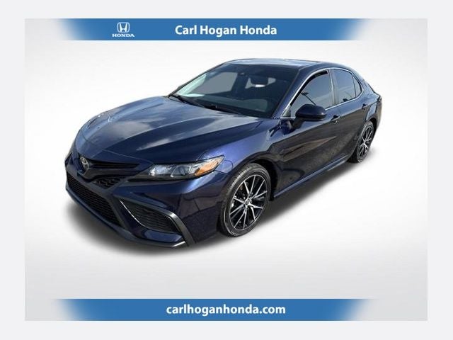 2021 Toyota Camry SE in Blueprint — front three-quarter view