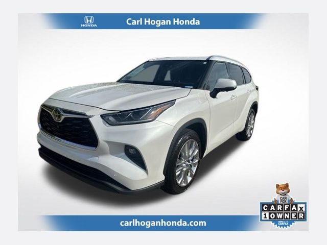 2023 Toyota Highlander Limited in Pearl — front three-quarter view